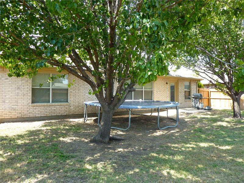 Trees offer shade in the yard.