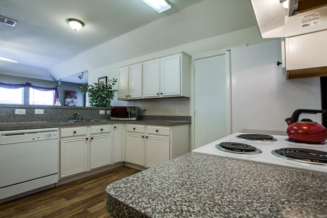 Plenty of storage space and counter space is found in the kitchen.