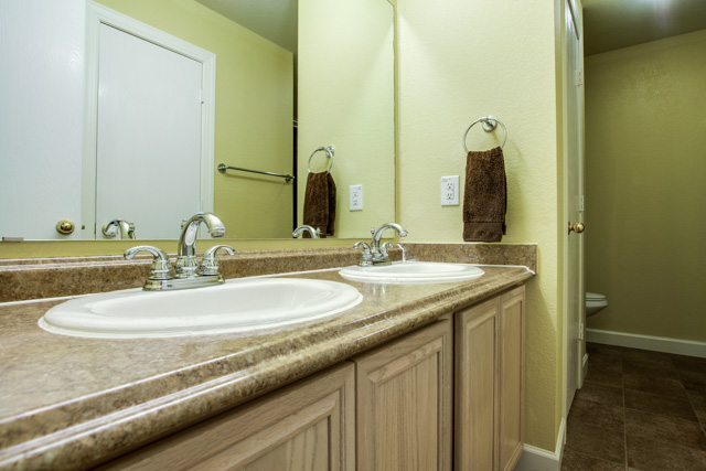 Master bath has dual vanities and granite-like countertops!