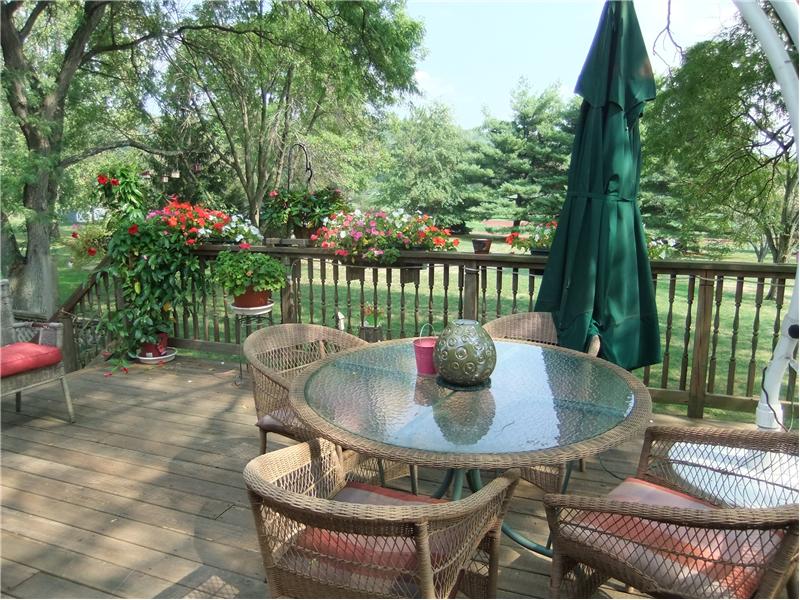 Deck overlooking beautiful yard