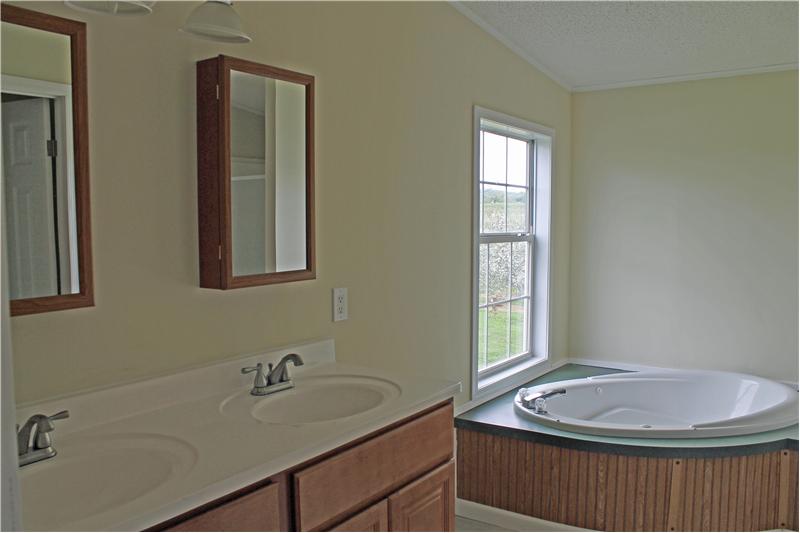 Double Sinks in Master Bath w/Garden Tub and Shower