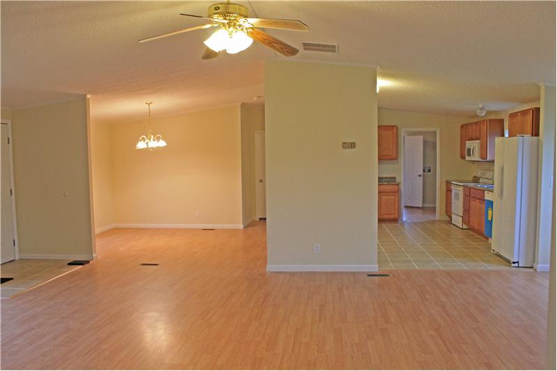 Large Living Room Open to Kitchen and Dining