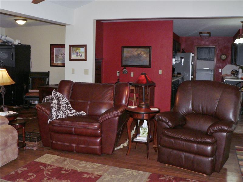 Living w/red wall desk/study area