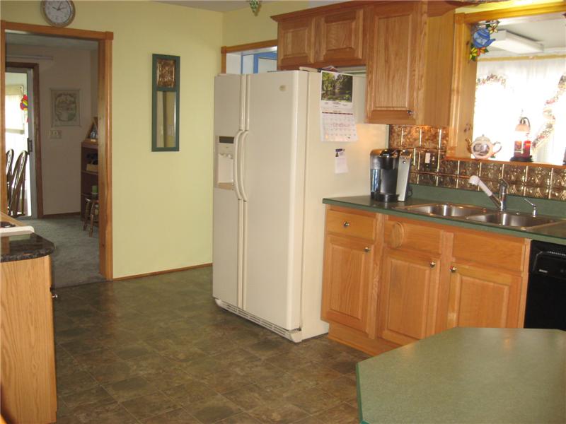 Kitchen with oak cabinets