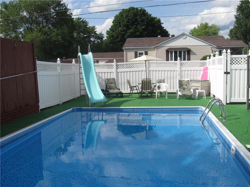Beautiful inground pool with patio area