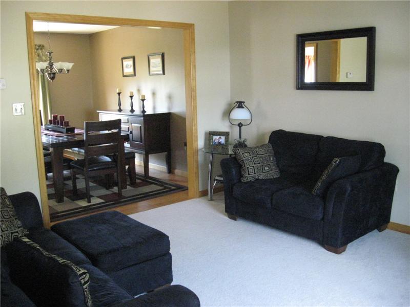 Living room with carpeting.