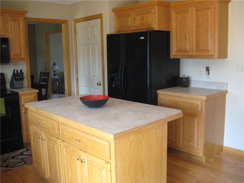 Open eat-in kitchen with center island.