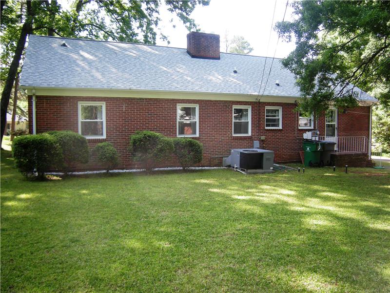 Rear view of this beautiful, full brick ranch home