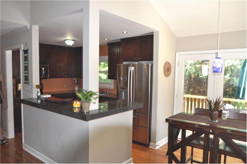 Eat-in kitchen with access to the landscaped backyard