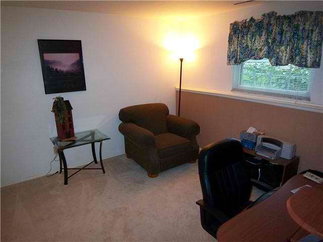 Den:  Sitting area/ office area of master suite