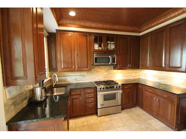Remodeled kitchen with granite countertops