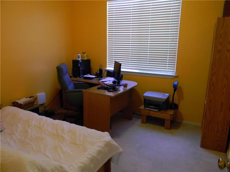 This bedroom doubles as an office