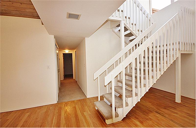 Staircase leading to master suite