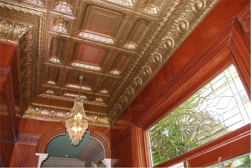 Mohagany Paneling & Bronze painted Pressed Tin Ceilings in Wet Bar Area