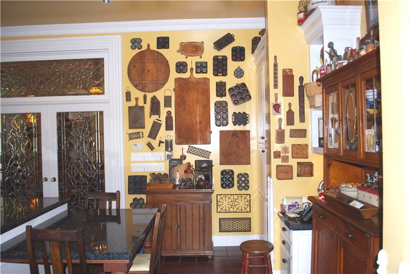 Multi level Kitchen Island & White Cabinets with pull out Shelving