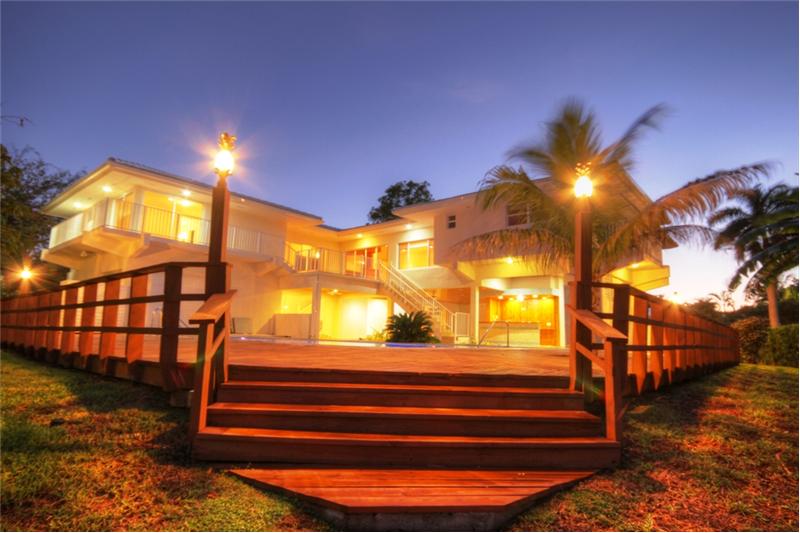 Beautifully lit exterior wooden patio with private dock and deep water direct ocean no bridges access.