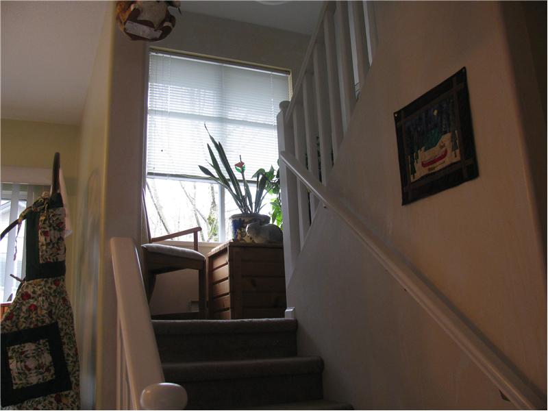 Stais leading to the bedrooms