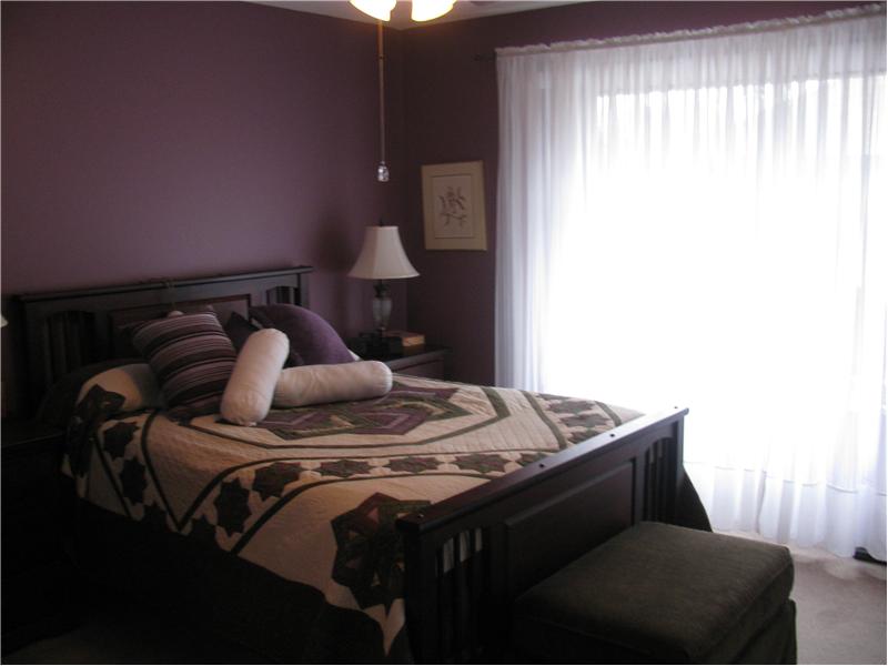 Master bedroom showing large windows