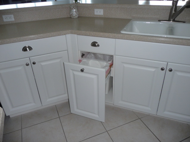 Concealed garbage cabinet