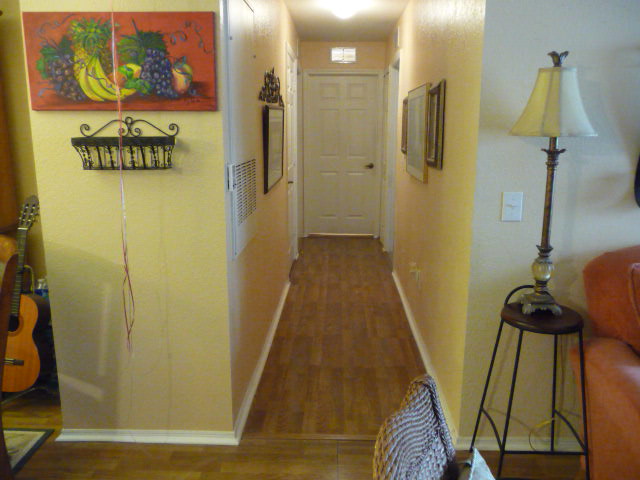 Hallway leading to 3 BR